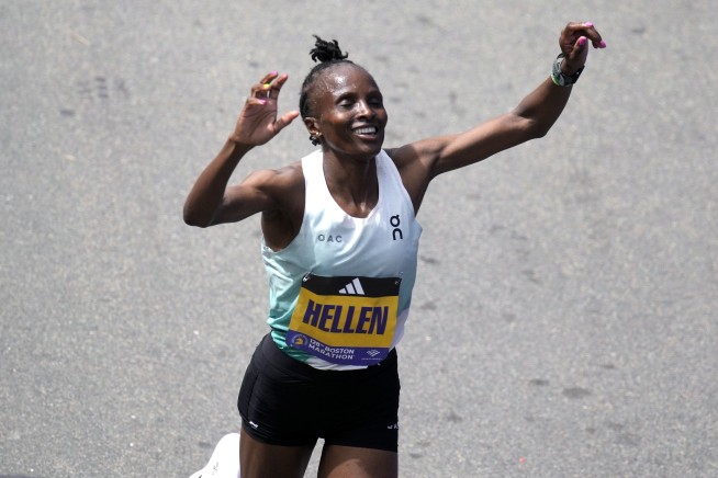 Ethiopia's Sisay Lemma wins Boston Marathon in runaway. Kenya's Hellen Obiri repeats in women's race