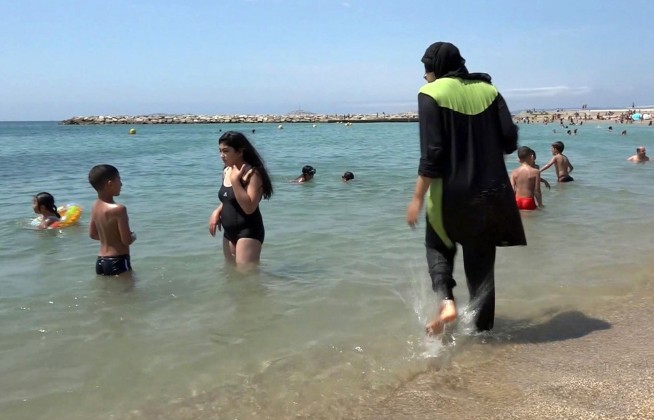 France rules against burkini swimwear for religious reasons