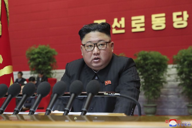 Kim vows to improve ties with outside world at party meeting