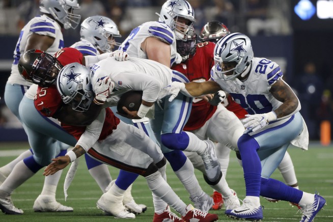 Brady, Bucs throttle Cowboys 19-3 as Prescott injures hand