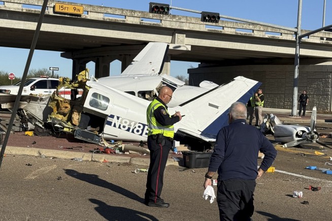 Propeller plane crashes onto a Texas highway, sending 4 people to hospitals
