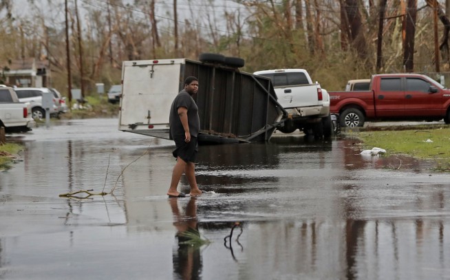 The Latest: Stretch of I-10 closed for debris removal