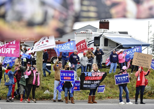 Surging coronavirus colors White House race in closing days