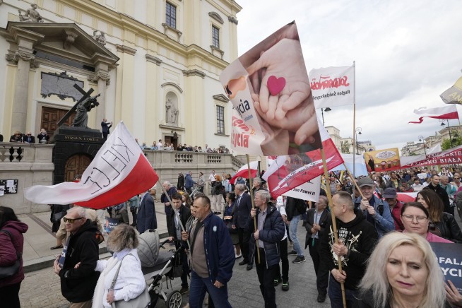 Polish opponents of abortion march against recent steps to liberalize strict law