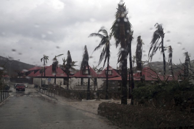 The Latest: Maria continues strengthening, hits 175 mph