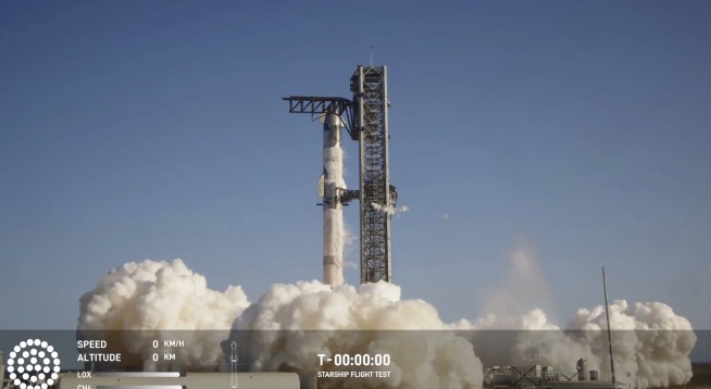 SpaceX launches giant Starship rocket, but aborts attempt to catch booster with mechanical arms