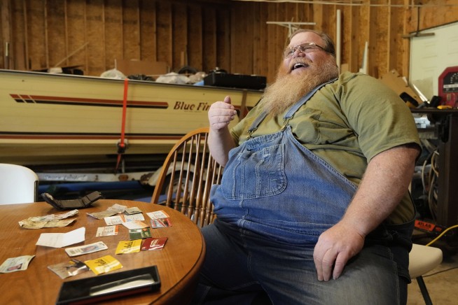 A Michigan autoworker's wallet is found under a hood in Minnesota — 151,000 miles later