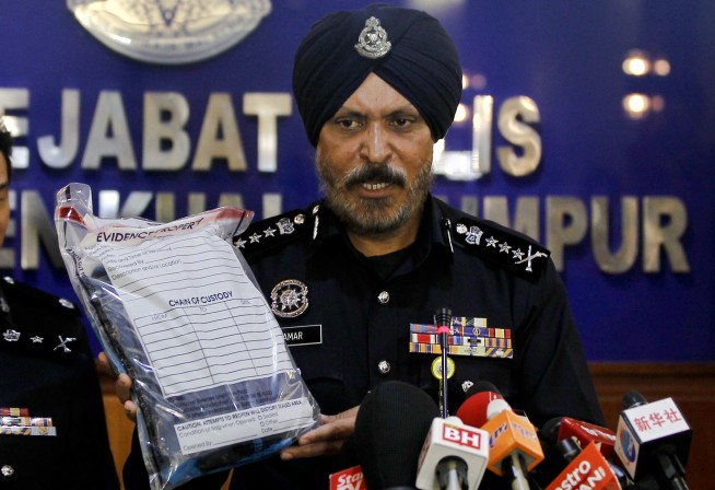 Malaysia police arrest 7 boys linked to deadly school fire