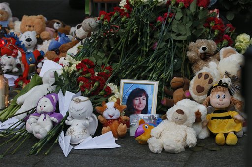 The Latest: Deeply shaken Russians mourn plane crash victims