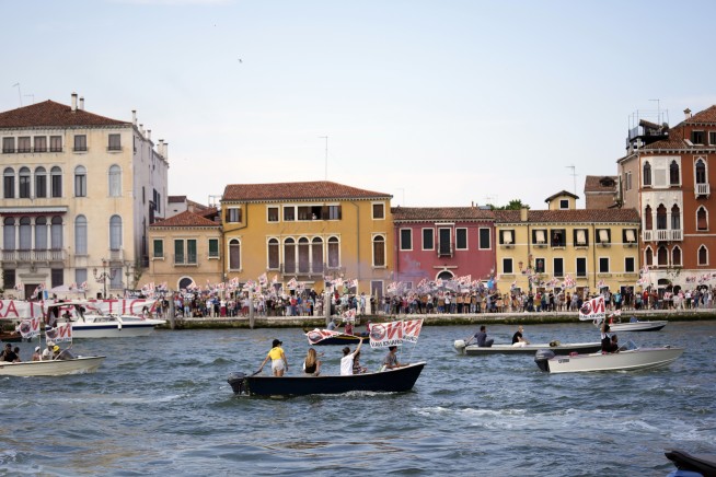 Cruise ships restart in Venice, bring environmental protests