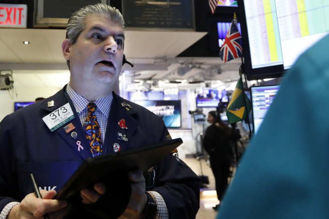 Dow sinks 2.9% after rate cut fails to stem market's dread