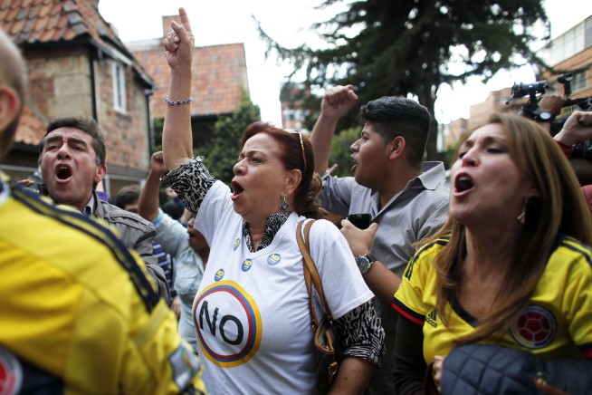 Colombia's leader to push ahead on peace after shock defeat