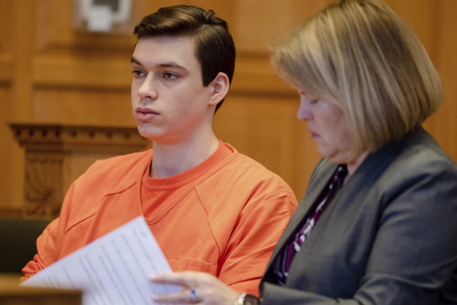 2 Iowa teens plead guilty in Spanish teacher's beating death