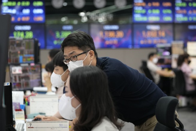 Wall Street adds to its records; energy stocks, banks gain