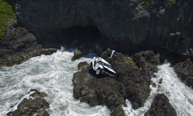 The Latest: Lawyer trying to bail out twin in separate case