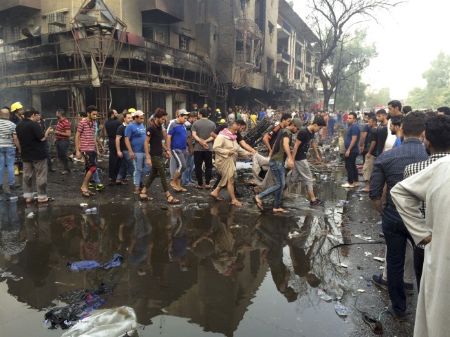 Iraqi officials: 91 people killed in 2 bombings in Baghdad