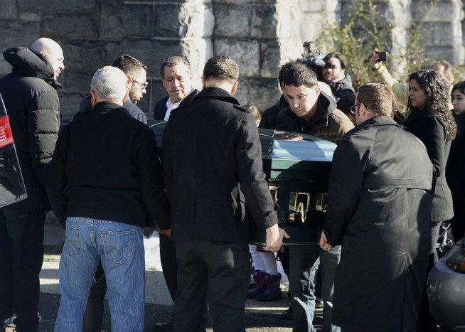 Authorities say suspect in suitcase death is in US illegally