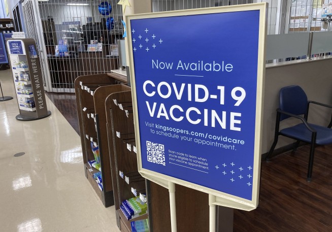 US mandates vaccines or tests for big companies by Jan. 4