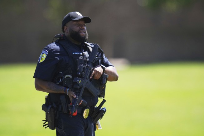 Student accused in Dallas school shooting walked toward group in hall and opened fire, injuring 4