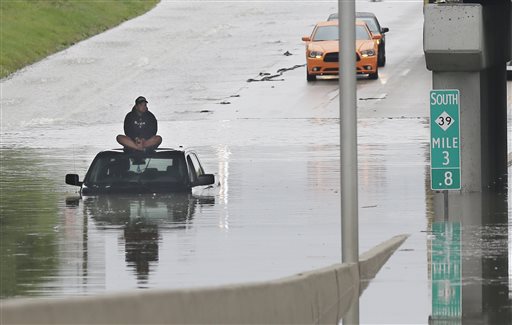 Dead 100-year-old woman found in flooded basement