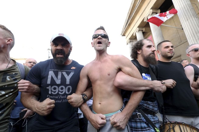 Virus measures targeted by protesters despite case spikes