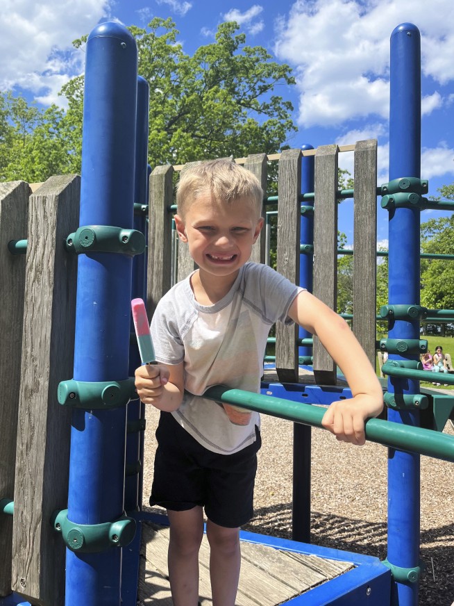 Boy shot in July 4 parade massacre returns home to family