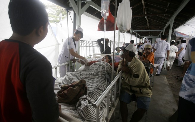At least 91 dead after quake rocks Indonesian tourist island