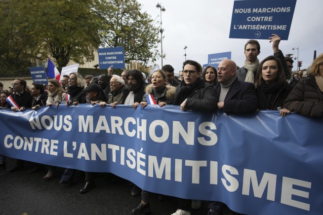 More than 180,000 people across France march against soaring antisemitism amid the Israel-Hamas war