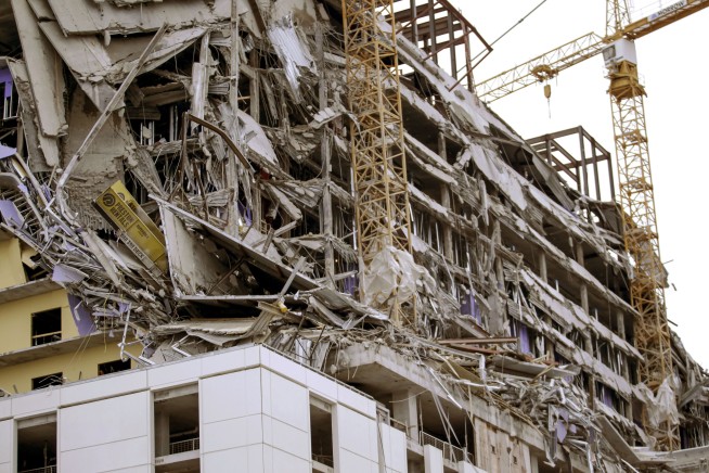 Dangerous search on for 1 missing after hotel collapse