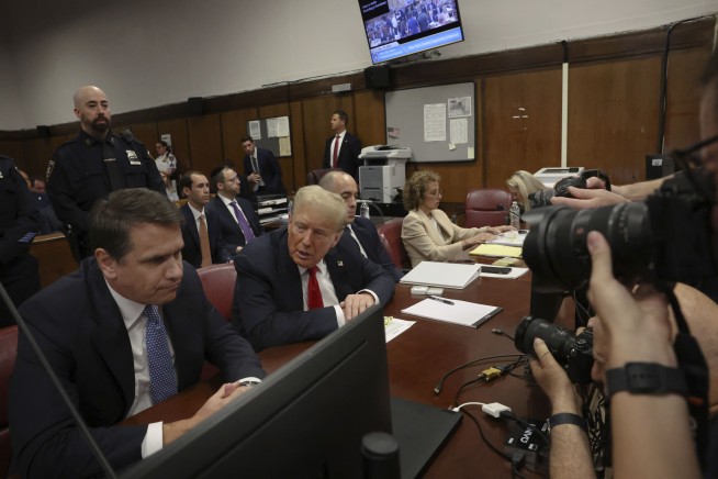 Prosecutor says Trump tried 'to hoodwink voters' while defense attacks key witness in last arguments