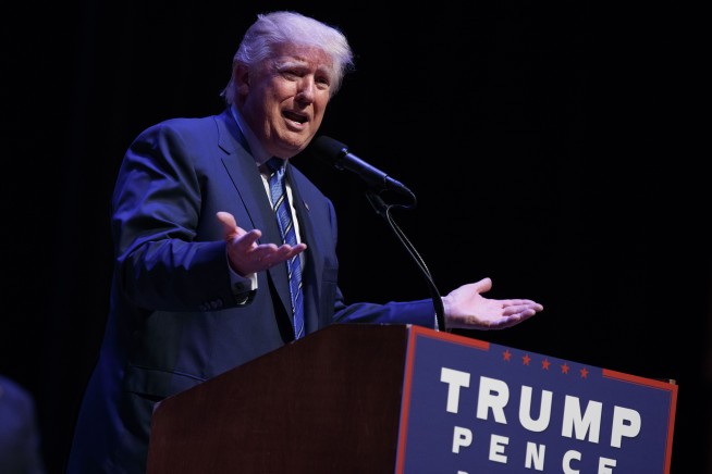 The Latest: Kaine tours brewery in Wisconsin visit