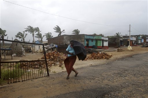 Strong cyclone lashes India; typhoon hits Japan