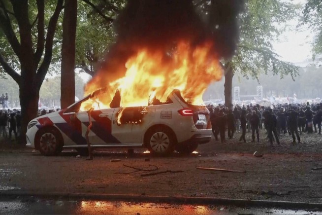 Violence erupts at right-wing demonstration in the Netherlands ahead of election