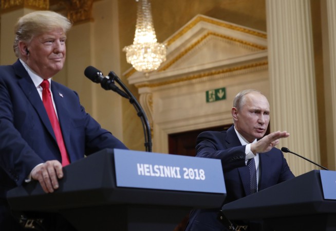 The Latest: Trump says he misspoke on Russia meddling