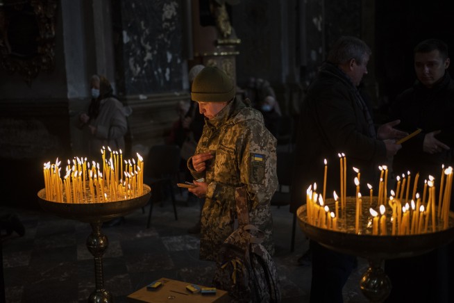 Russia sets cease-fire for evacuations but battles continue