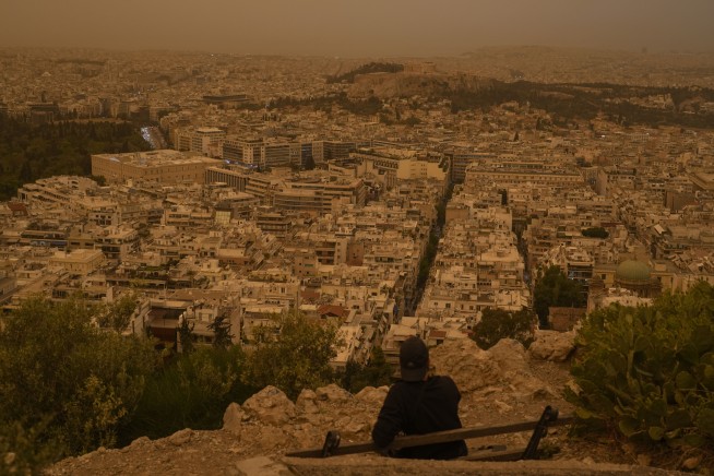 Martian skies over Athens? Greece's capital turns an orange hue with dust clouds from North Africa