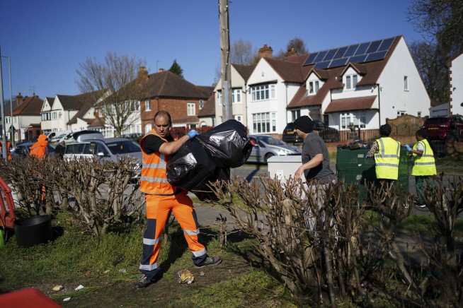 Garbage piles up on Birmingham's streets as a sanitation strike in the UK city enters its 5th week