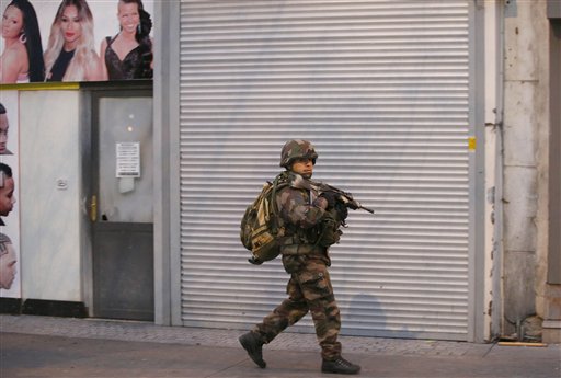 2 dead, 7 arrested in raid targeting Paris attack mastermind