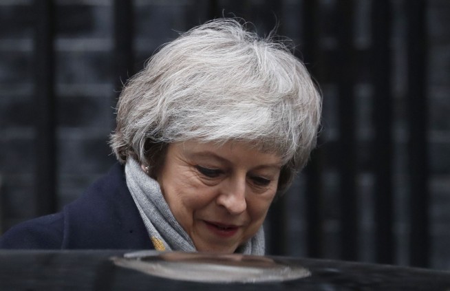 The Latest: UK Parliament to hold govt no-confidence vote