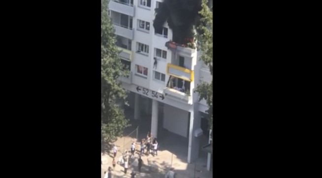 2 boys saved when caught in falls in French apartment fire