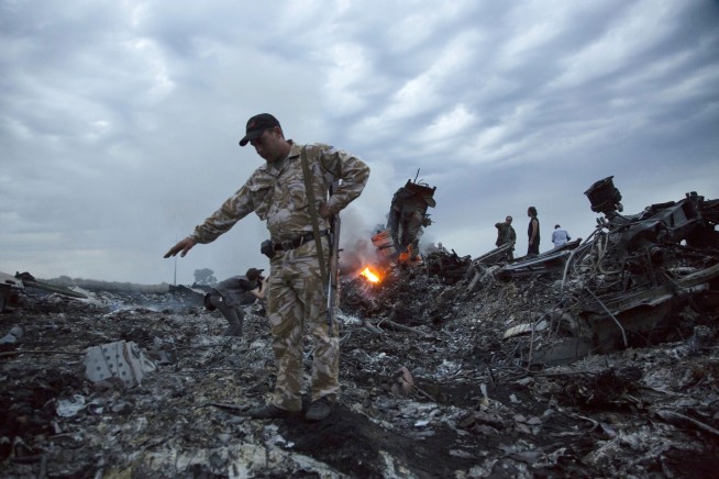 The Latest: Ex-rebel leader denies blame for MH17 downing