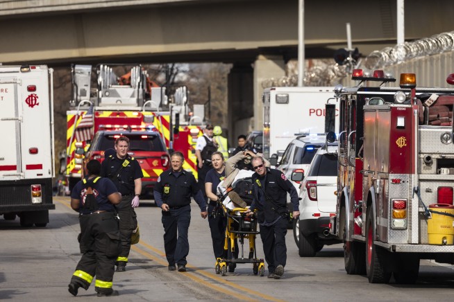 Chicago commuter train crashes into rail equipment, nearly 40 injured, some seriously