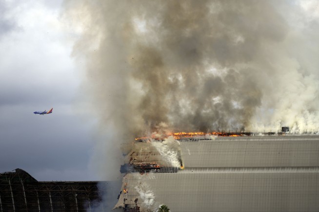 Raging fire destroys massive World War II-era blimp hangar in Southern California