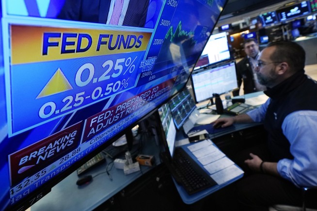 Stocks, yields end higher after Fed raises interest rates