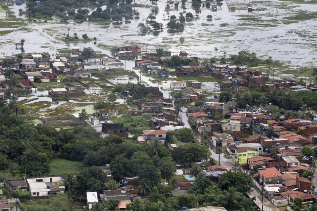 Death toll from Brazil floods at least 91, with dozens lost