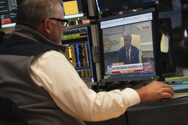 US stocks dip after careening through a manic day following Trump's latest tariff threat