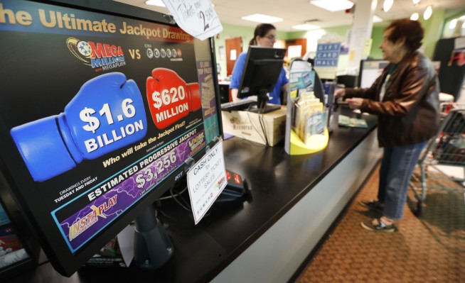 The Latest: $1.537 billion lottery win just shy of record