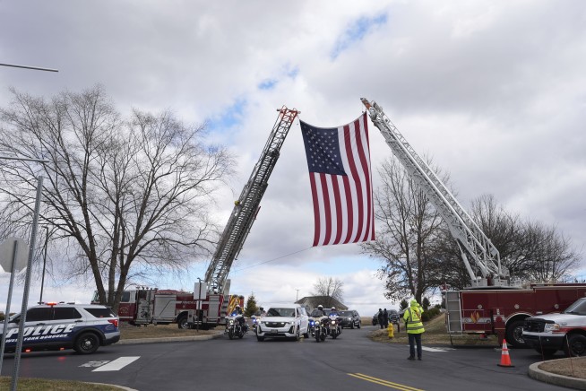 Officer killed in gunman's Pennsylvania hospital siege was felled by police fire, prosecutor says