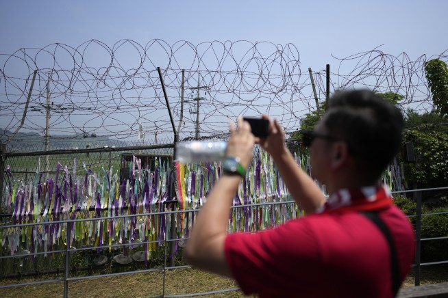 South Korean troops fired warning shots after North Korean soldiers briefly crossed land border