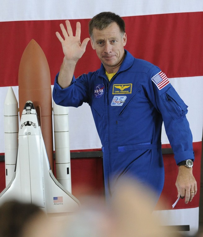 Astronaut chooses daughter's wedding over space test flight
